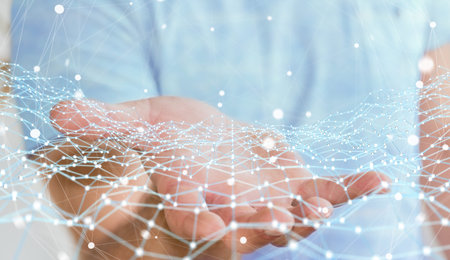 Businessman on blurred background holding flying network dot 3D rendering