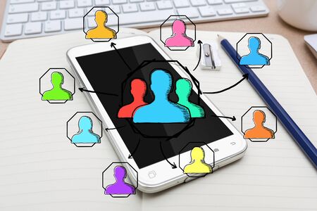 Hand drawn social media presentation with icons on office backgroundの写真素材