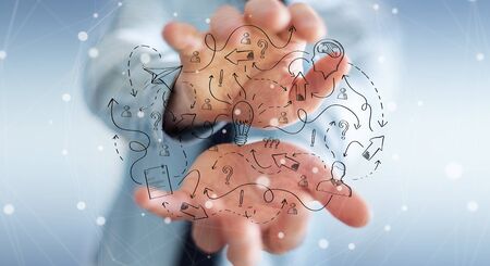 Businessman on blurred background holding manuscript project presentation with his handの写真素材