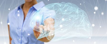 Businesswoman touching digital human brain with cell and neurons activity 3D renderingの写真素材