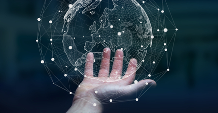 Businessman holding global network and data exchanges over the world 3D renderingの写真素材