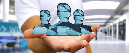 Businessman on blurred background holding shiny glass avatar group 3D renderingの写真素材