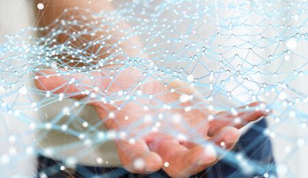 Businessman on blurred background holding flying network dot 3D renderingの写真素材