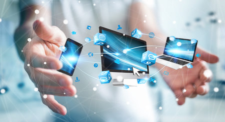 Businessman connecting tech devices and icons applications with each other 3D rendering