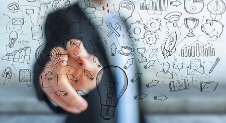 Businessman on blurred background touching manuscript project presentation with his fingersの写真素材