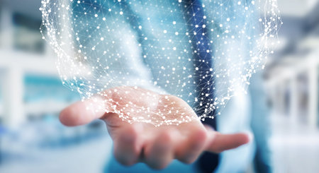 Businessman on blurred background holding flying network sphere 3D rendering