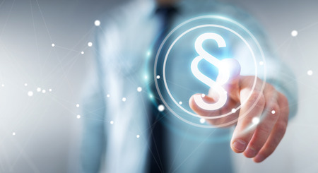 Businessman on blurred background using law protection right 3D renderingの写真素材