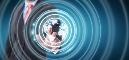 Businessman on blurred background using web interface to surf on internet 3D renderingの写真素材