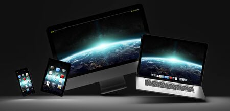 Modern computer laptop mobile phone and tablet in the dark 3D renderingの写真素材
