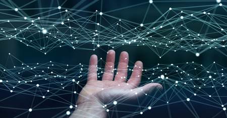 Dot flying network held by businessman on blurred background 3D renderingの写真素材