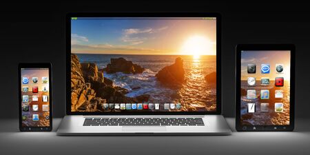 Modern computer laptop mobile phone and tablet in the dark 3D renderingの写真素材