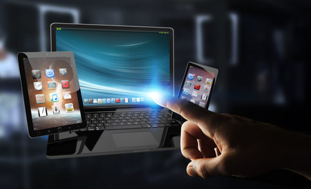 Businessman on blurred background touching laptop phone and tablet with his finger 3D rendering