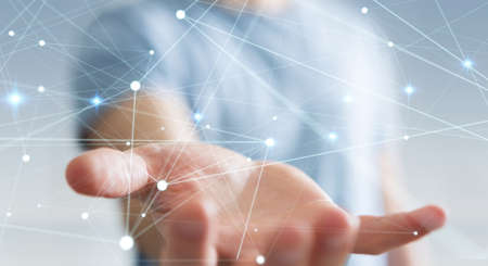 Dot flying network held by businessman on blurred background 3D renderingの写真素材