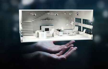 Businessman on blurred background holding white 3D rendering apartmentの写真素材