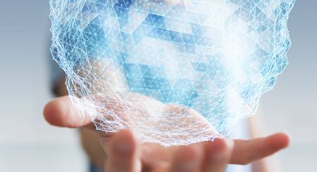 Businessman on blurred background holding flying network sphere 3D renderingの写真素材