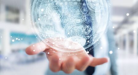 Businessman holding white and blue hologram sphere 3D renderingの写真素材