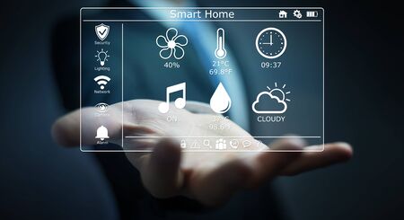 Businessman on blurred background using smart home digital interface 3D renderingの写真素材