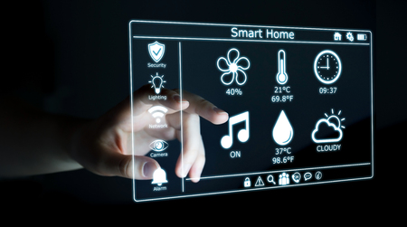 Businessman on blurred background using smart home digital interface 3D renderingの写真素材