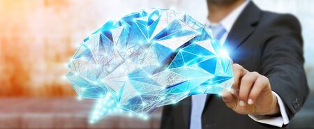 Businessman holding digital human brain with cell and neurons activity 3D renderingの写真素材