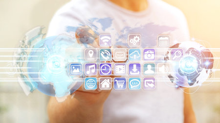 Businessman on blurred background connecting worlds to icons and applications software 3D rendering