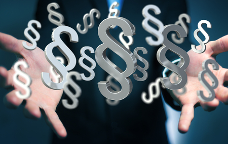 Businessman on blurred background using law protection right 3D renderingの写真素材