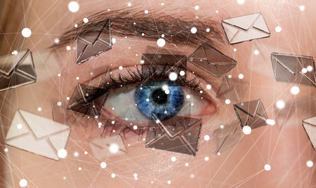 Close-up of woman eye sending digital transparent emails 3D renderingの写真素材