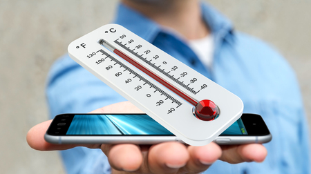 Businessman checking the temperature rise with a thermometer 3D renderingの写真素材