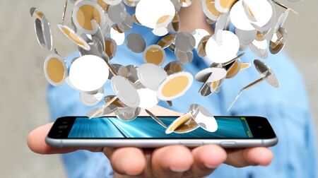 Businessman on blurred background holding flying currency coins in his hand 3D renderingの写真素材