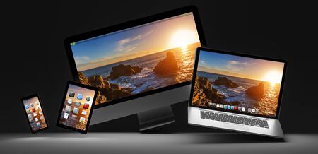 Modern computer laptop mobile phone and tablet in the dark 3D renderingの写真素材
