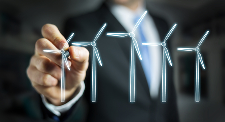 Businessman on blurred background drawing renewable energy sketchの写真素材