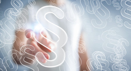 Businessman on blurred background touching law protection right symbolの写真素材