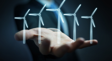 Businessman on blurred background hloding renewable energy sketchの写真素材