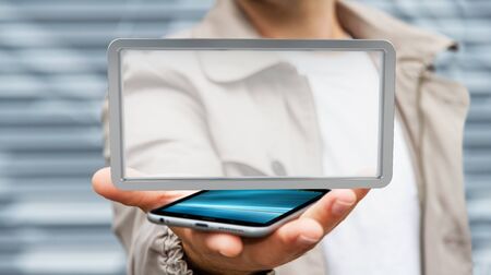 Businessman on blurred background using digital screens tablet 3D renderingの写真素材