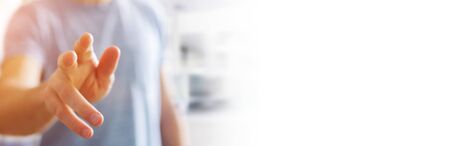 Panorama view of businessman pointing finger on blurred backgroundの写真素材