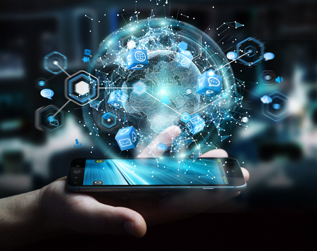 Flying earth network interface activated by mobile phone on blurred background 3D renderingの写真素材