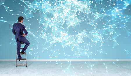 Businessman in modern interior using connection network on a wall 3D renderingの写真素材