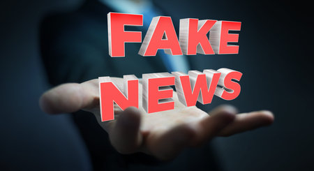Businessman on blurred background discovering fake news information 3D renderingの写真素材
