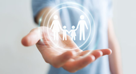 Businessman on blurred background holding family interface in his hand 3D renderingの写真素材