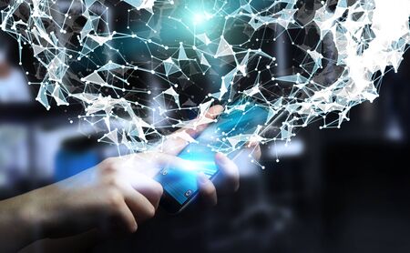 Businessman on blurred background holding flying network connection over mobile phone 3D renderingの写真素材