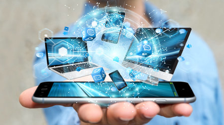 Tech devices connected to each other by businessman on blurred background 3D rendering