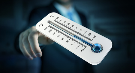 Businessman checking the temperature drop with a thermometer 3D renderingの写真素材