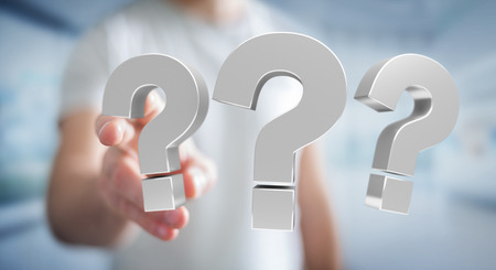 Businessman on blurred background using 3D rendering question marksの写真素材
