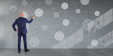 Businessman in modern interior using social network interface on a wall 3D rendering