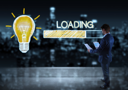 Businessman watching loading sketch on a rooftop with a city view 3D renderingの写真素材