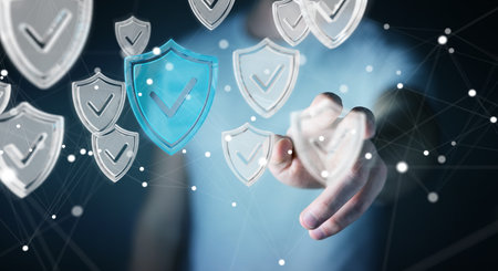 Businessman on blurred background using modern data shield antivirus 3D rendering