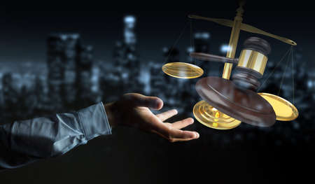 Businessman on blurred background with justice hammer and weighing scales 3D renderingの写真素材
