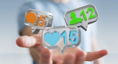 Businessman on blurred background using digital colorful social media icons 3D rendering