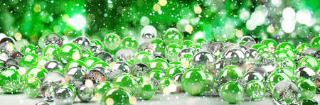 Green and white christmas baubles on snowy background 3D renderingの写真素材