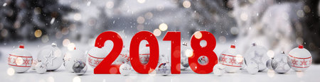2018 new year eve with white and red christmas baubles on snow background 3D renderingの写真素材