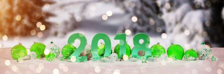 2018 new year eve with green and white christmas baubles and candles 3D renderingの写真素材